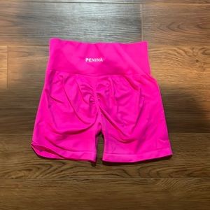 Pink butt scrunch booty shorts